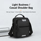 Men’s crossbody bag in black with padded handle, front zip pocket, and wide strap