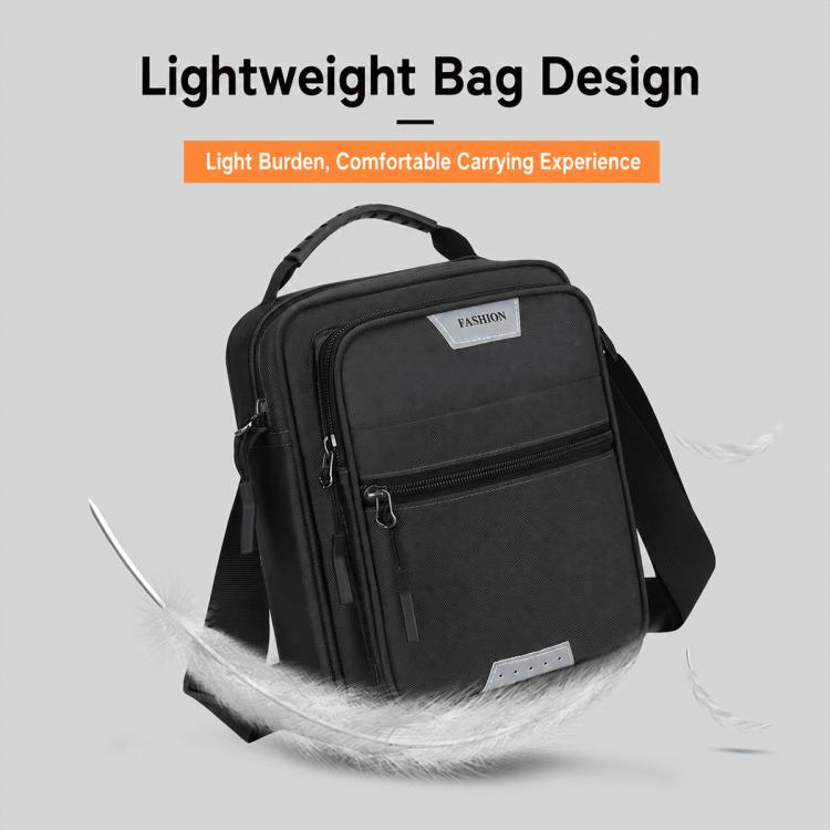 Men’s crossbody bag in black with front zipper and adjustable shoulder strap