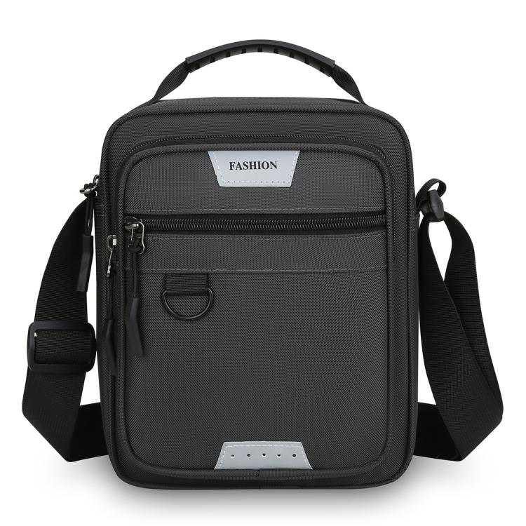 Men's dark crossbody bag with front zip pocket and adjustable shoulder strap