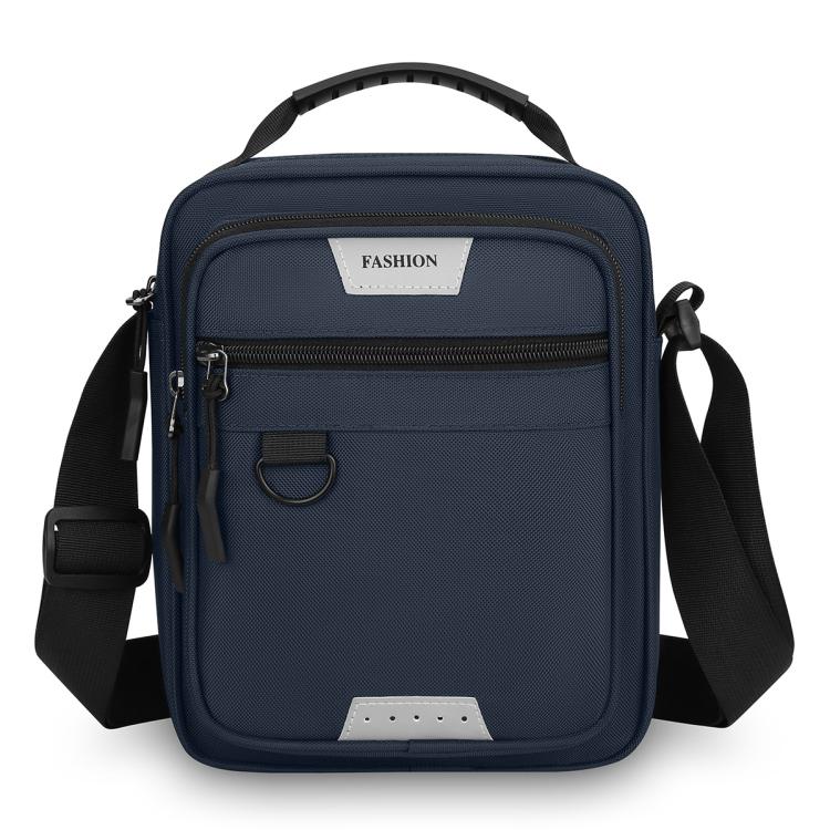 Men's blue crossbody bag with top handle, front zip pocket, and shoulder strap