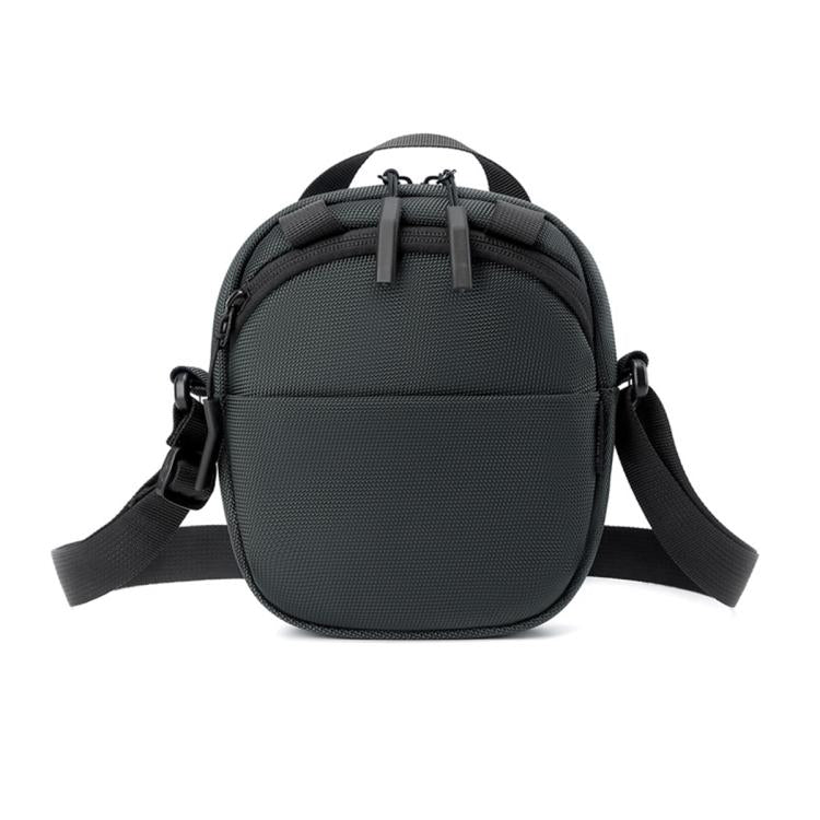 Dark gray round nylon crossbody bag with adjustable shoulder strap and front zipper pocket