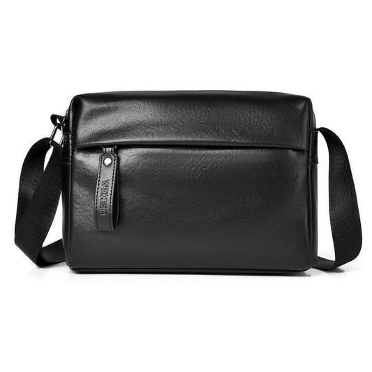 Black PU leather crossbody bag with flap front, zip closure, and adjustable strap