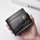 Black leather men’s wallet with multi-card slots and front flap, shown in hand.