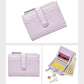 Lilac card wallet with zip coin pouch and multiple card slots, wrist strap