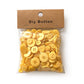 Pack of round resin buttons, yellow mixed sizes with 2-4 holes, in clear bag