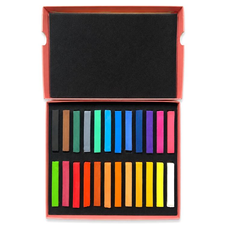 Pastel chalk sticks set box open with colorful rectangular sticks arranged in tray.