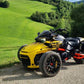 Smoked dashboard cowl on a Can-Am Spyder trike, black tinted front spoiler