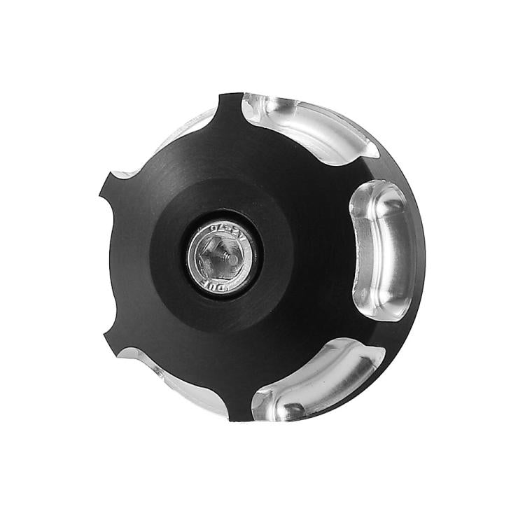 Black motorcycle handlebar end cap with circular center insert and chrome edges