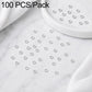 Silver open jump rings, 100-piece set with rings in a white dish and scattered