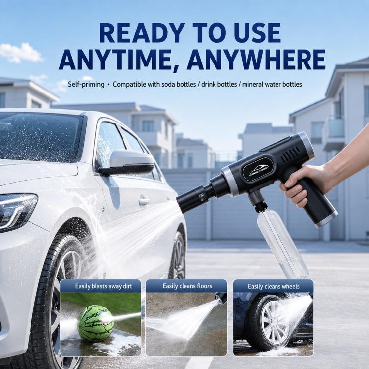 Handheld car washer gun spraying water toward vehicle wheels
