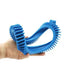 Blue tire belt ring held in hand, showing gear teeth and outer profile