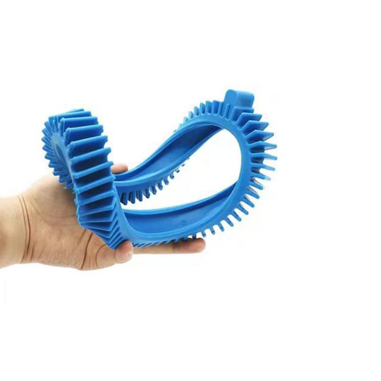 Blue tire belt ring held in hand, showing gear teeth and outer profile