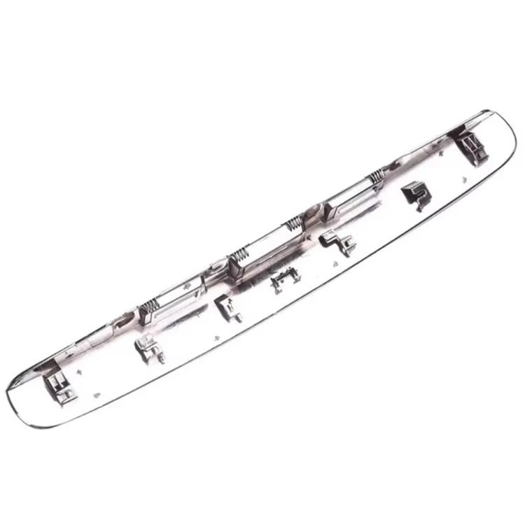 Rear tailgate handle cover showing the underside with mounting clips and tabs.
