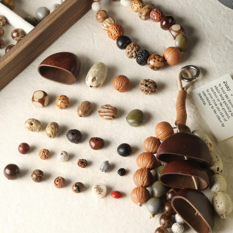 Natural bodhi seed loose beads strand set with mixed brown, orange, white and green beads