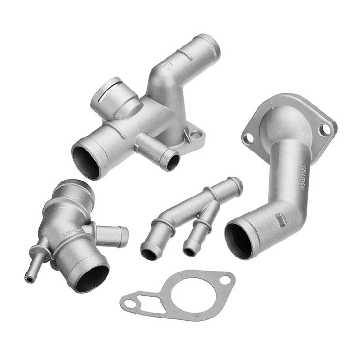 Silver metal coolant hose connector kit with multiple T and elbow pipes, gasket included