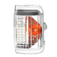 Close-up turn signal light lens with clear housing and orange reflector panel