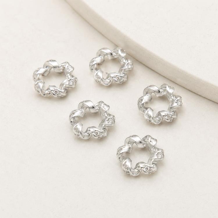 Silver-tone zircon inlaid loop spacer beads, round with sparkling clear stones