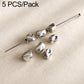 Assorted small dark silver beads with loop holes on a pin, textured rounded shapes