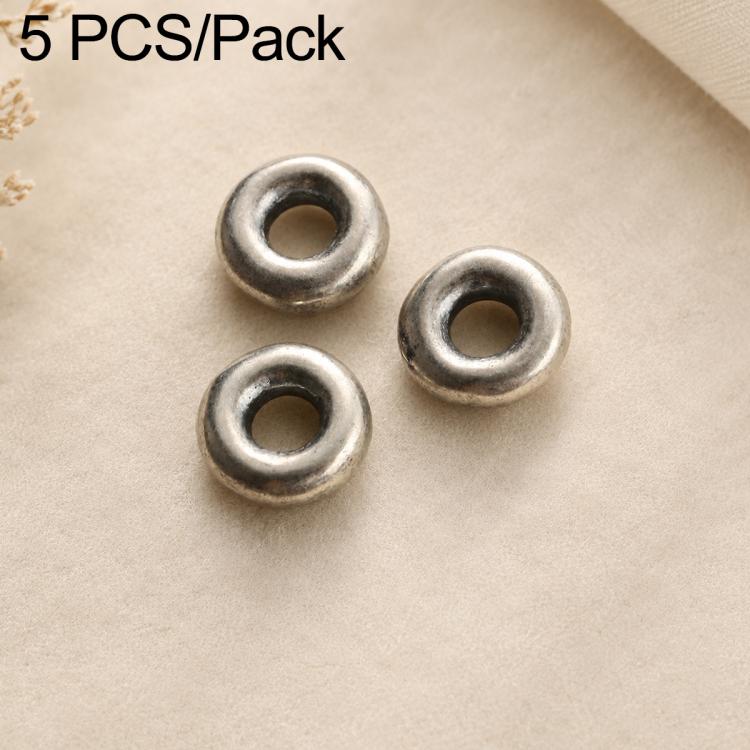 Three round dark silver spacer beads with central loop openings, textured outer rim