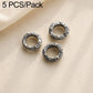 Three round vintage silver spacer beads with textured raised rim and center holes