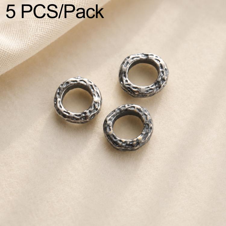 Three round vintage silver spacer beads with textured raised rim and center holes