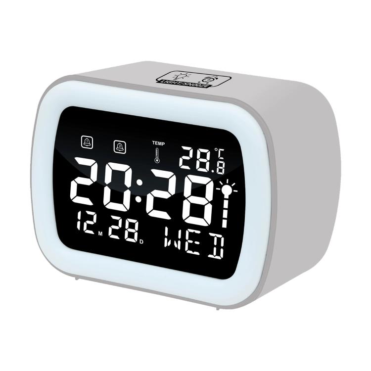 Light gray LED digital alarm clock with temperature display and night light, front view