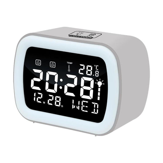 Light gray LED digital alarm clock with temperature display and night light, front view