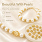 Gold 6-petal hollow flower bead caps with center hole, paired with pearl bracelet