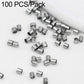 Silver-tone crimp end beads, close-up pile of small metal tube separator clips