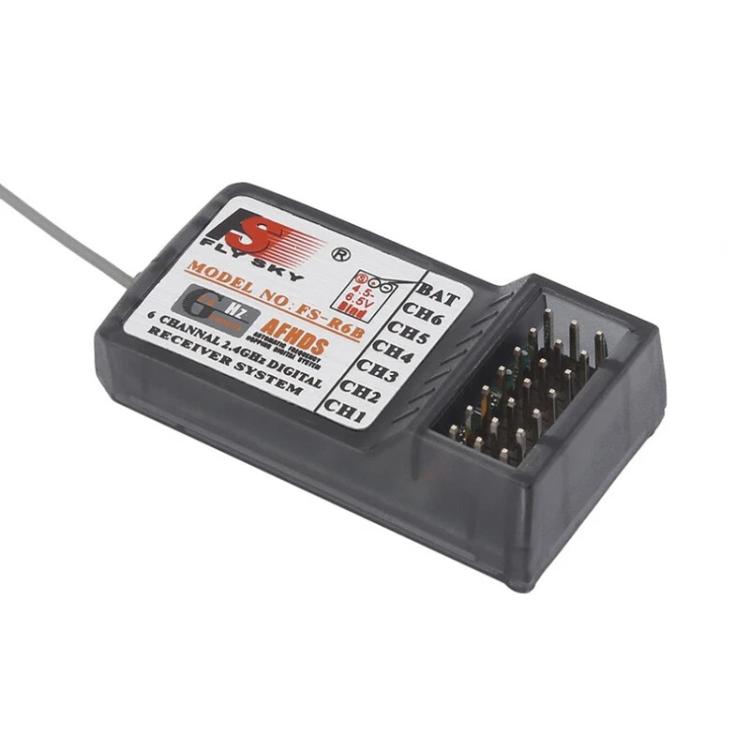 FlySky FS-R6B 2.4GHz 6CH receiver, angled view with gold pins and top window