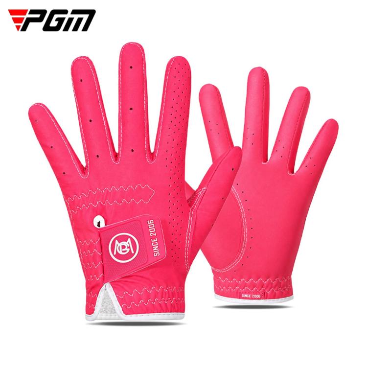 Pair of red kids golf gloves with perforated fingers and padded palm