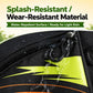 Golf bag pocket fabric detail, black with green panel and orange stripe, zip closure.