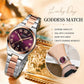 Two-tone women’s quartz watch on wrist, purple dial with roman numerals and date window.