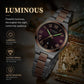 Women’s stainless steel quartz watch, dark brown dial with glowing hands and Roman numerals