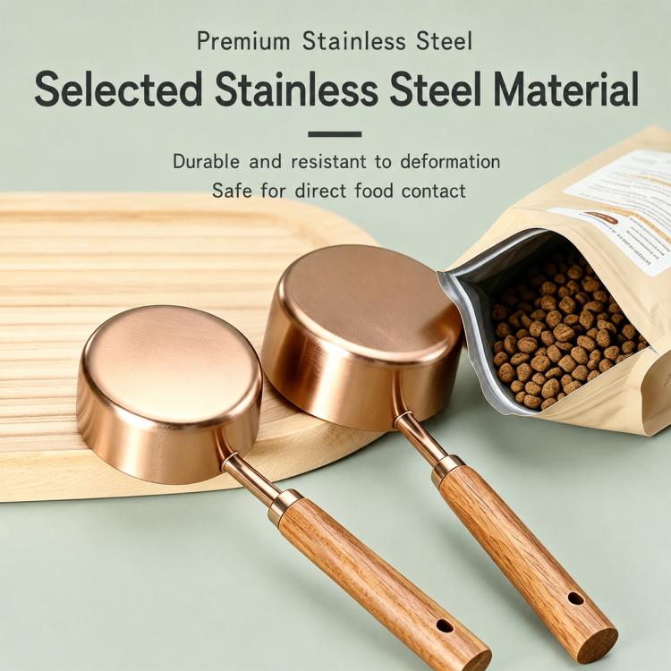 Set of stainless steel pet food measuring spoons with wooden handles and rose-gold cups