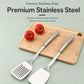 Stainless steel slotted and solid spatulas on a cutting board for everyday cooking