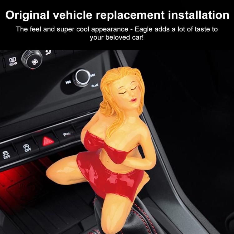 Car manual gear shift knob with glossy red bikini figure topper in car interior