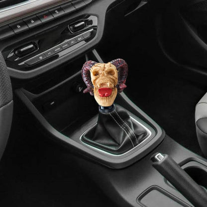 Ram skull gear shift knob with horned face, red tongue, black threaded base