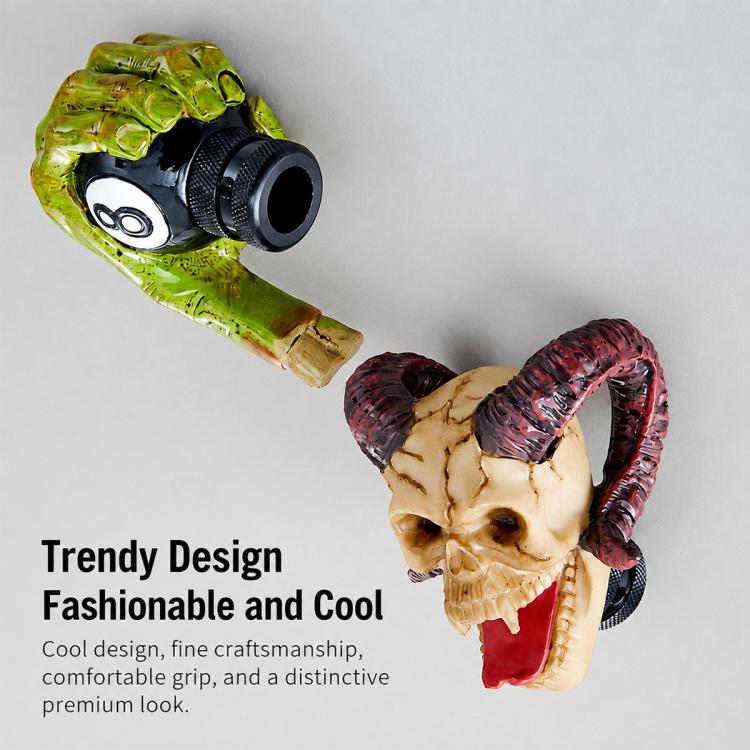 Resin ram skull gear shift knob and green 8-style knob, both with black textured base
