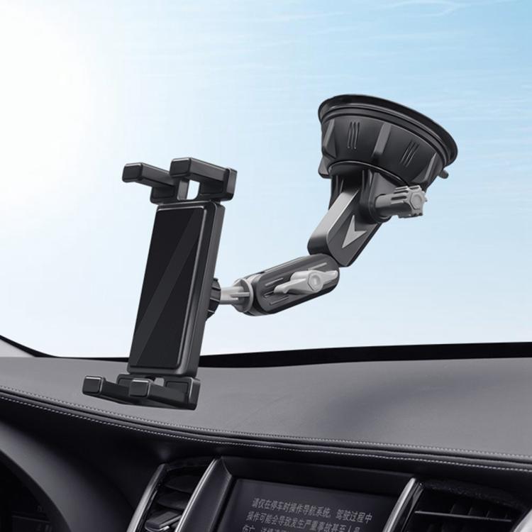Car dashboard suction holder with adjustable clamp arms, standing on a round suction base