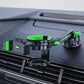 Car dashboard phone and cup holder in black with green accents and suction base