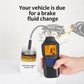 Digital brake fluid tester with orange LCD display and flexible probe near sample cup, hand held