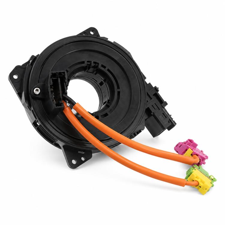 Black car steering wheel clock spring spiral cable, circular housing with orange wiring