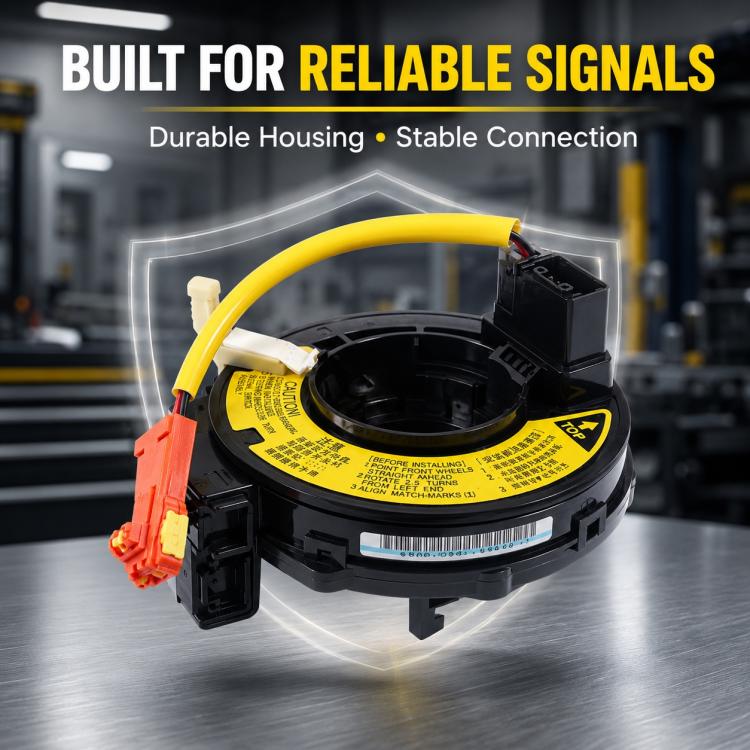 Steering wheel airbag clock spring spiral cable with yellow wire, black housing, and orange plug