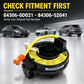 Steering wheel airbag clock spring spiral cable on silver surface, black housing with yellow wire