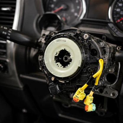 Steering wheel airbag clock spring spiral cable with yellow connectors, black housing