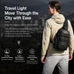 Black crossbody chest bag worn on a person, with adjustable shoulder strap.