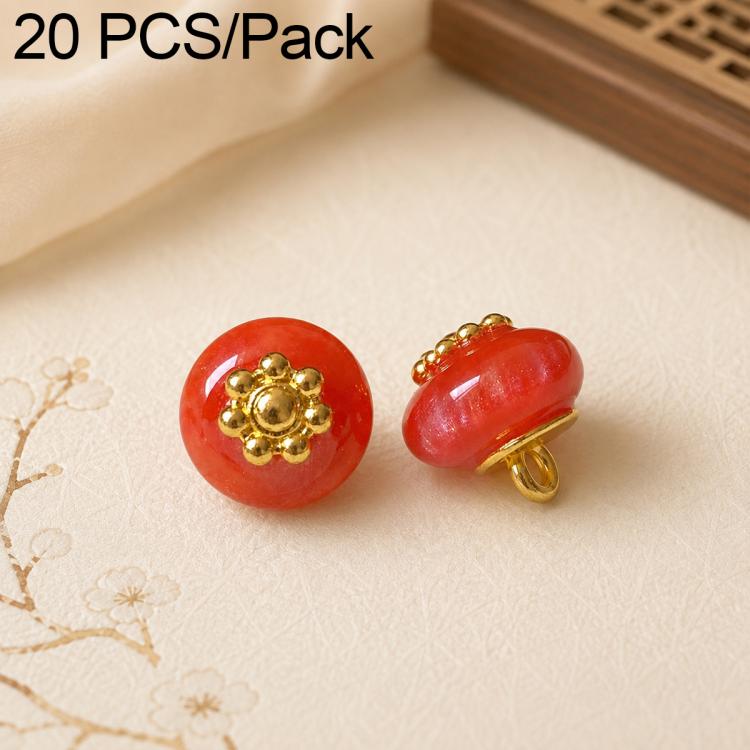Red resin flat flower-shank buttons with gold decorative flower tops, 2 shown