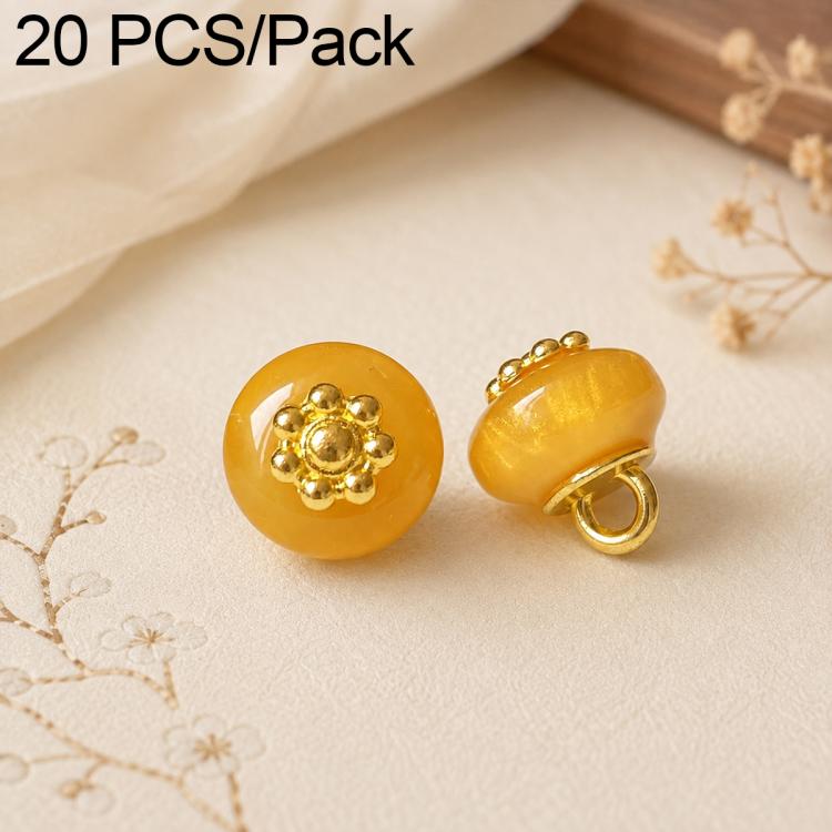 Yellow resin flat flower-shank buttons with gold decorative flower tops, 2 shown