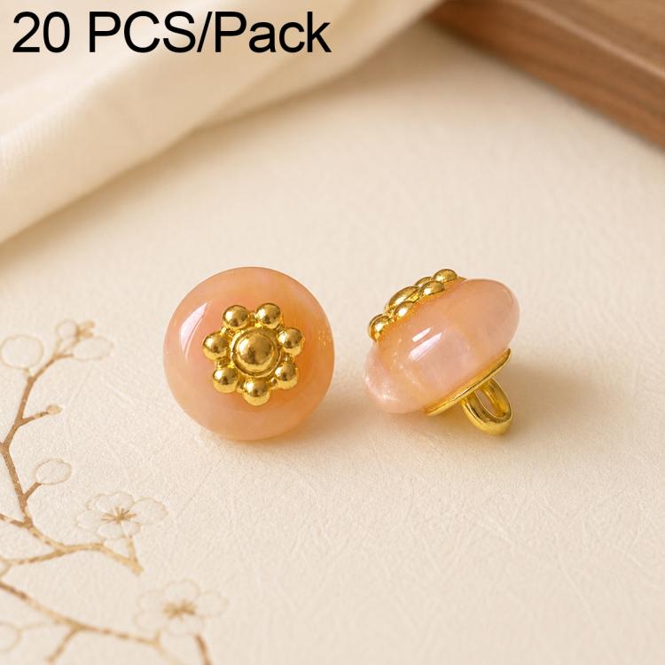 Peach resin flat flower-shank buttons with gold decorative flower tops, 2 shown
